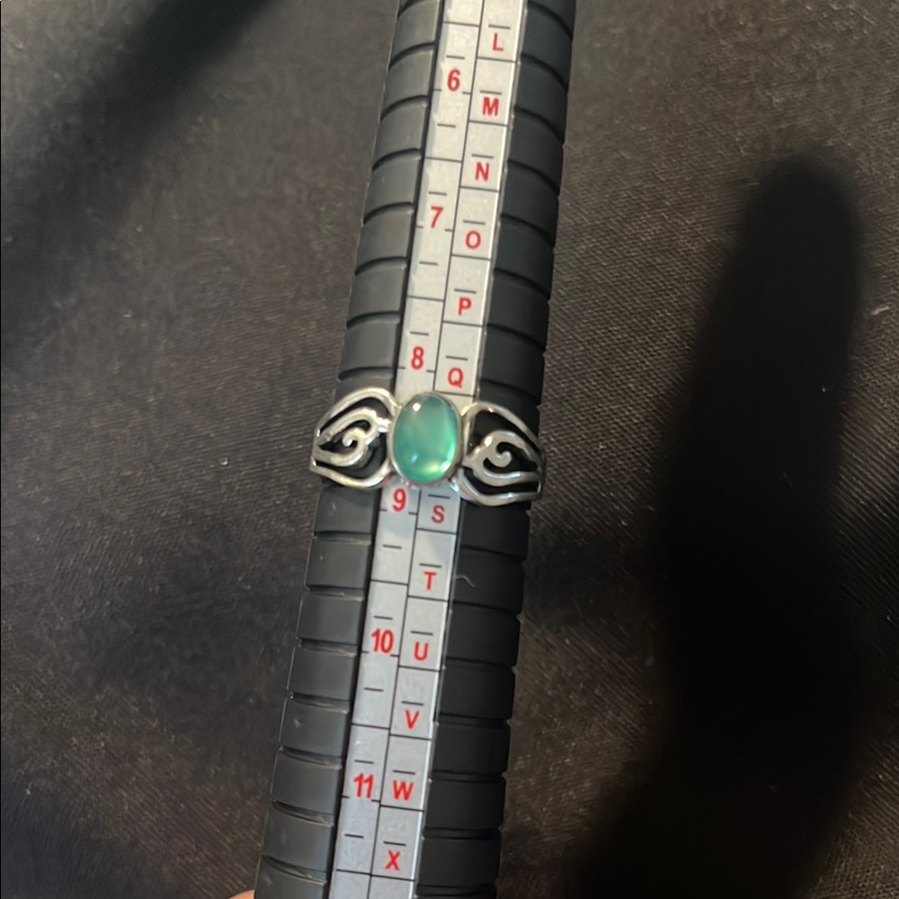 Elegant Silver Ring with Green Stone